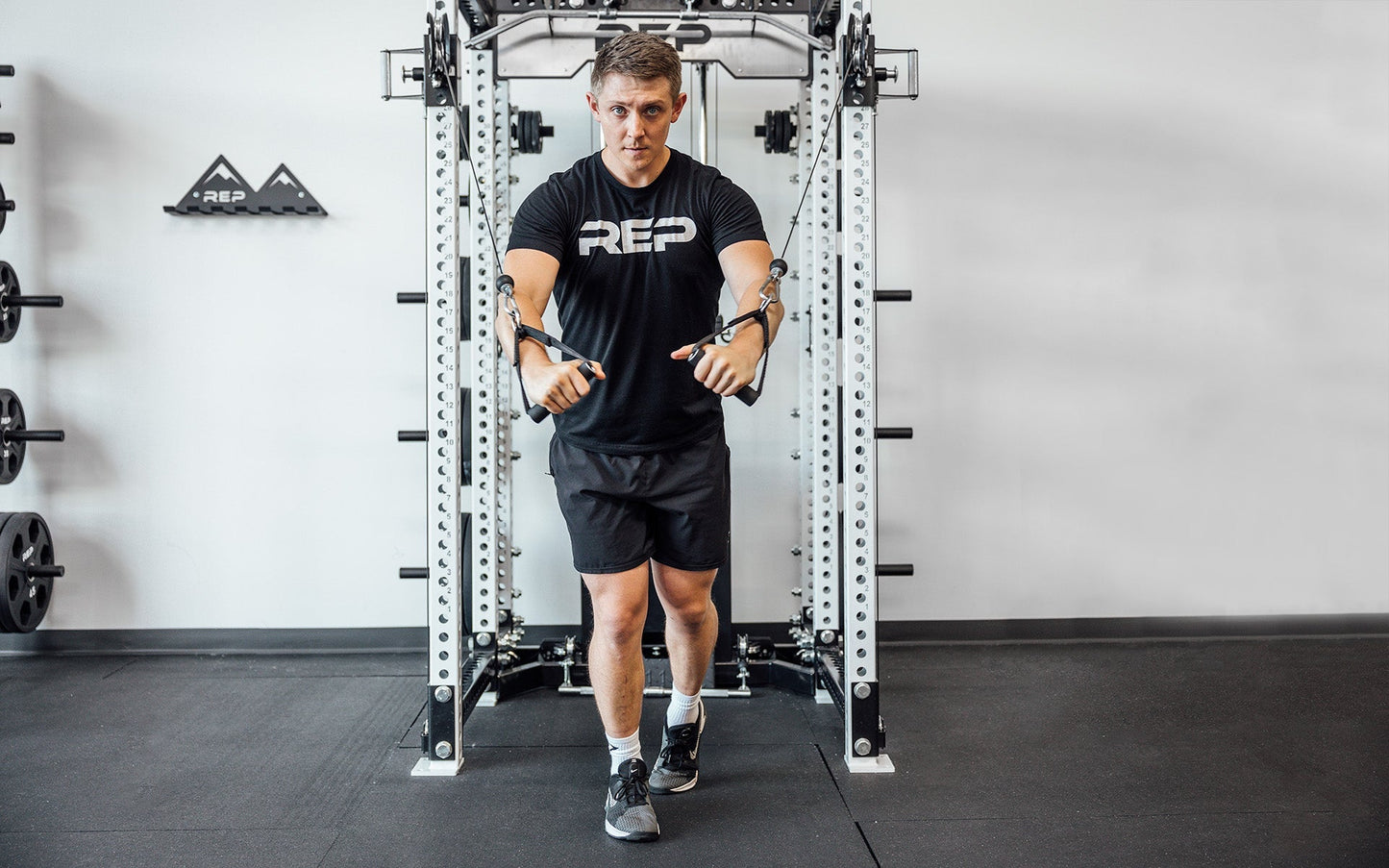 Neoprene D-handles being used for Cable Fly from Rep Fitness UK | Shop Best Premium Gym Equipment for Home & Commercial Use Online