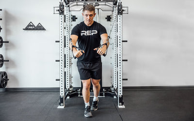 Neoprene D-handles being used for Cable Fly from Rep Fitness UK | Shop Best Premium Gym Equipment for Home & Commercial Use Online