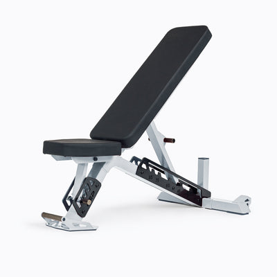 Nighthawk Bench White Metal Finish Adjustable Weight Bench – compact, high-performance bench for home and light-commercial gyms; 7- and 14-gauge steel frame, 7 back and 4 seat positions, CleanGrip™ vinyl pad, knurled handle, heavy-duty wheels, IPF-compliant 16.7” height, vertical storage, and compatibility with leg curl and roller attachments from Rep Fitness UK | Shop Premium Gym Equipment for Home & Commercial Use Online