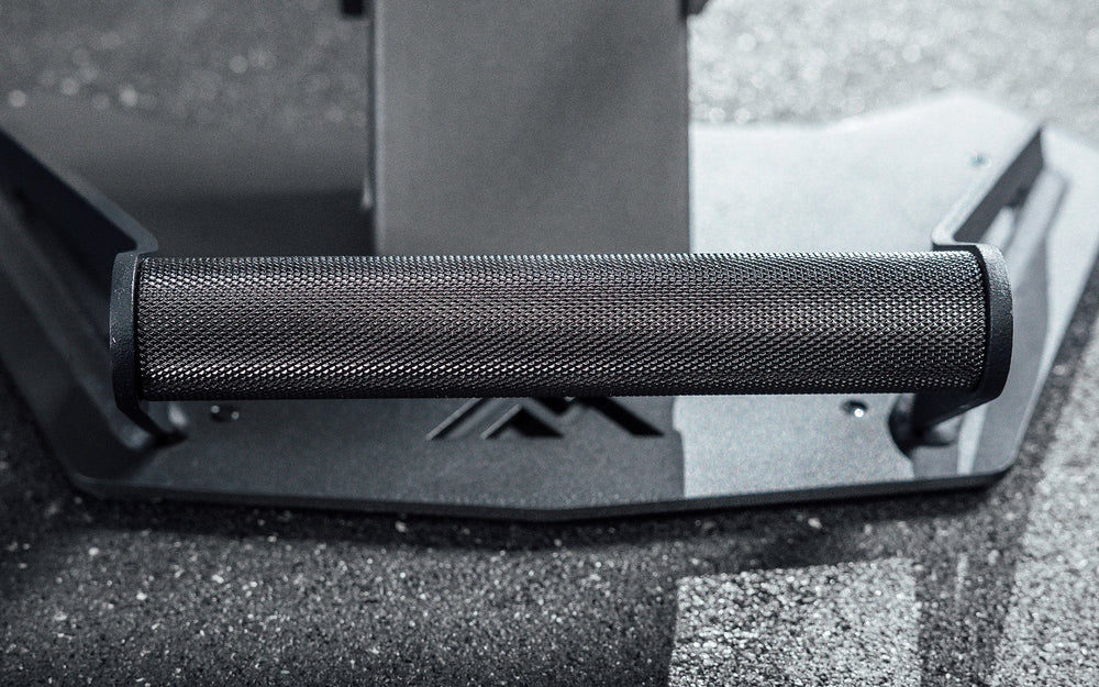 Nighthawk matte black bench foot rest grip bar closeup from Rep Fitness UK | Shop Premium Gym Equipment for Home & Commercial Use Online