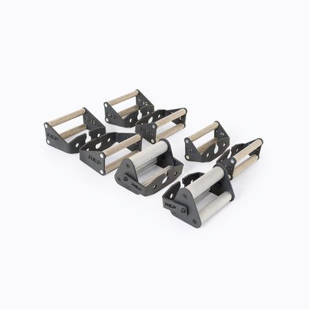 Open Trap Bar with standard handles standing vertically on its integrated deadlift jack.