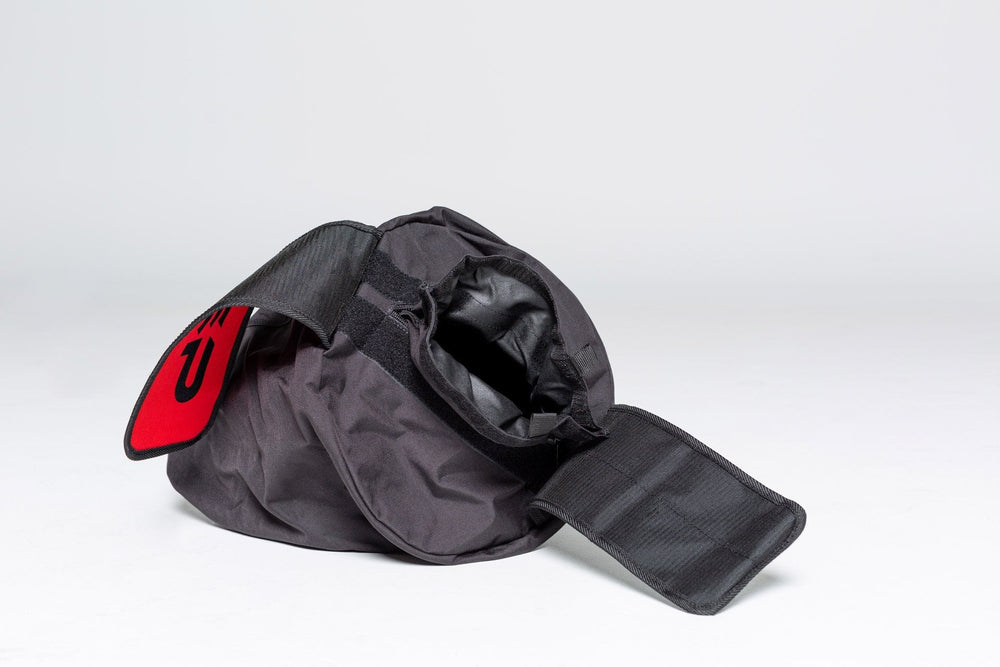 Opened up 150lb Stone Sandbag - heavy-duty, triple-stitched sandbags with reinforced seams and zipper for strength exercises like stone carries, cleans, presses, and squats. Available in 50lb, 75lb, 100lb, 150lb, 200lb and 250lb adjustable sizes from Rep Fitness UK | Shop Premium Gym Equipment for Home & Commercial Use, Best Online Gym Equipment UK