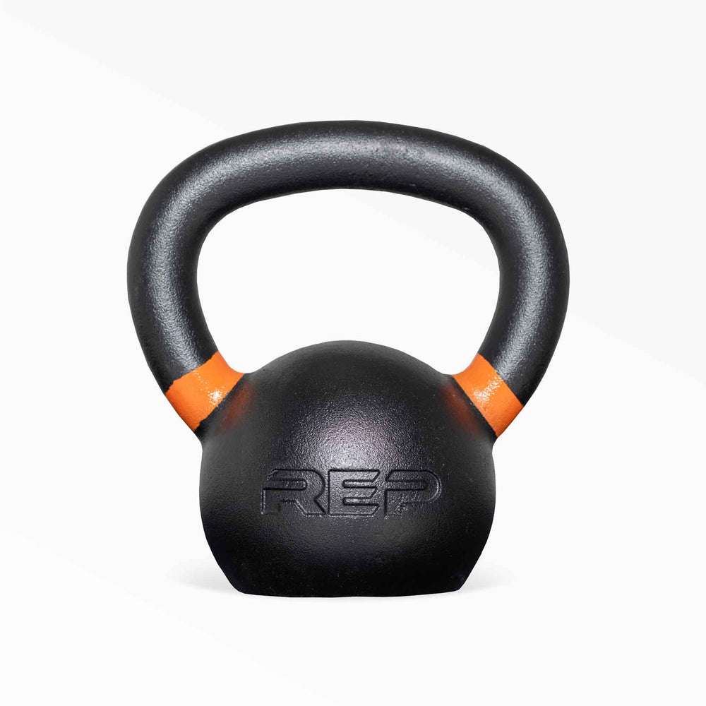 Orange 22kg marked kettlebell – premium cast-iron kettlebell from with color-coded handle, textured black coating for superior grip, and flat bases for stability; ideal for strength, conditioning, and full-body training; available individually or in sets from Rep Fitness UK | Shop Premium Gym Equipment for Home & Commercial Use, Best Online Gym Equipment UK
