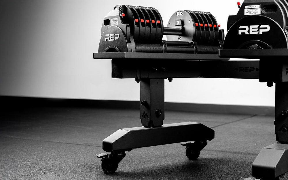Premium QuickDraw dumbbells with adjustable weight, fast switch adjustable  weight range technology and secure Lock-N-Load switches on a storage cart from Rep Fitness UK | Shop Premium Gym Equipment for Home & Commercial Use, Best Online Gym Equipment UK