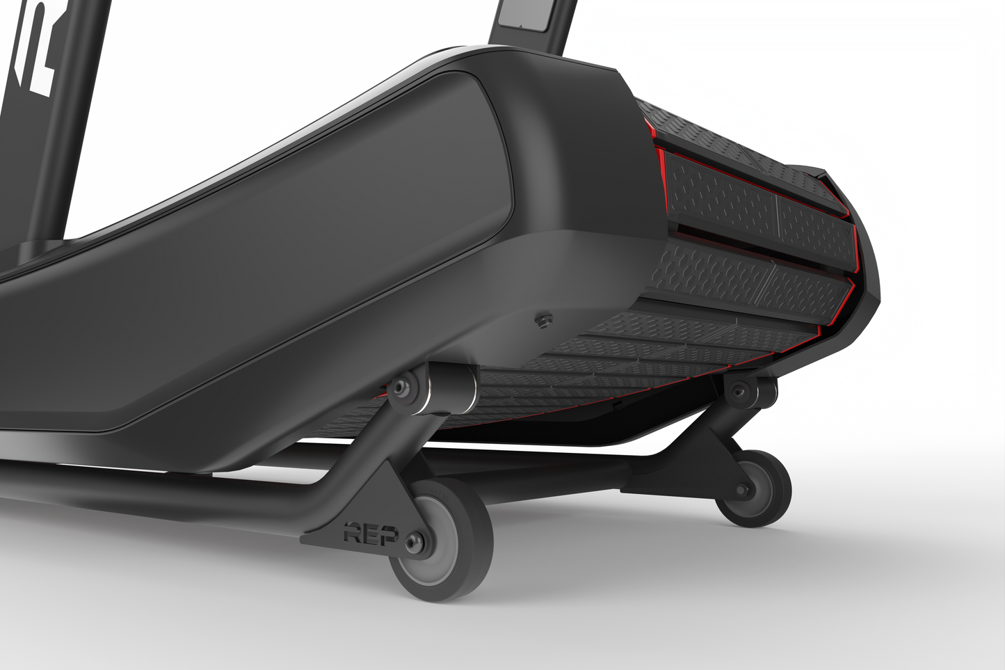 Close up of underneath the back end of REP® Strive Series Curved Treadmill with wheels.