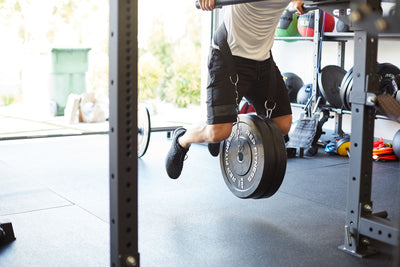 Athlete using the REP Dip Belt to perform weighted dips from Rep Fitness UK | Shop Best Premium Gym Equipment for Home & Commercial Use Online