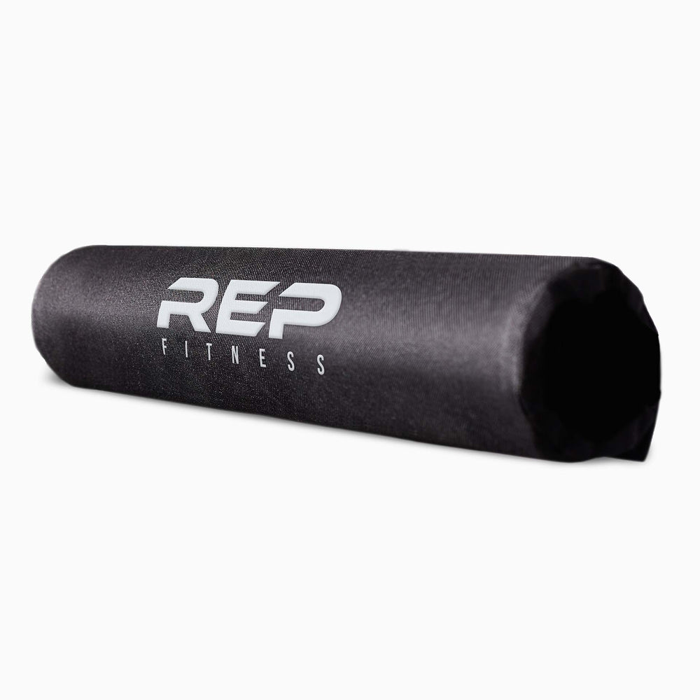 REP Fitness Barbell Shoulder Pad – soft, durable squat and hip thrust pad with Velcro closure for easy attachment; protects shoulders, neck, and hips during lifts; made from nitrile rubber and Oxford cloth; 17” long, 4” diameter with white REP Fitness logo stitching for comfort and style from Rep Fitness UK | Shop Premium Gym Equipment for Home & Commercial Use, Best Online Gym Equipment UK