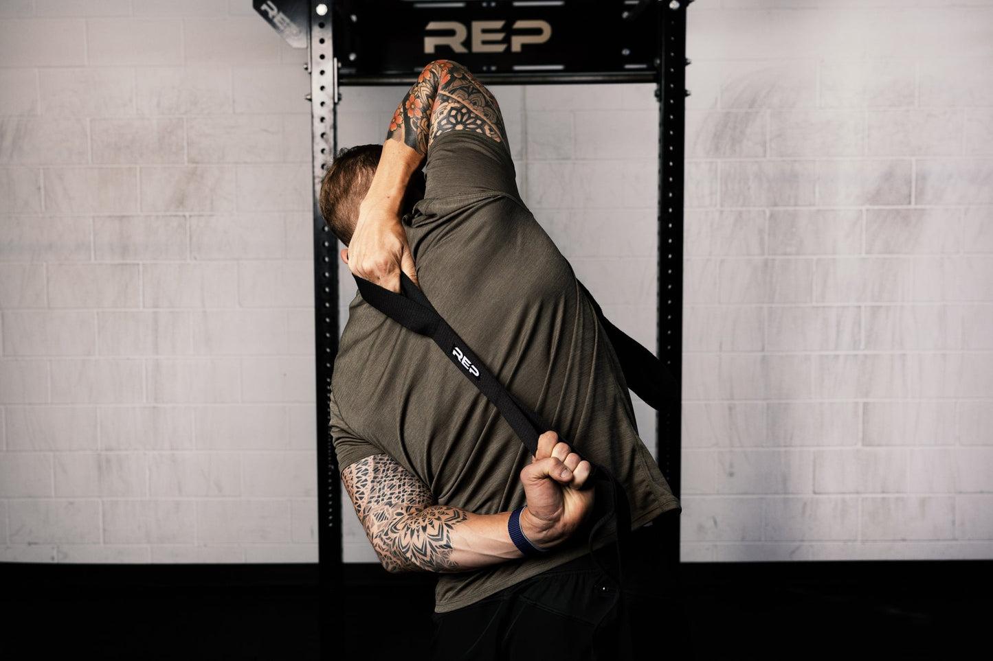 Stretch strap with multiple loops for controlled flexibility and mobility exercises from Rep Fitness UK | Shop Best Premium Gym Equipment for Home & Commercial Use Online