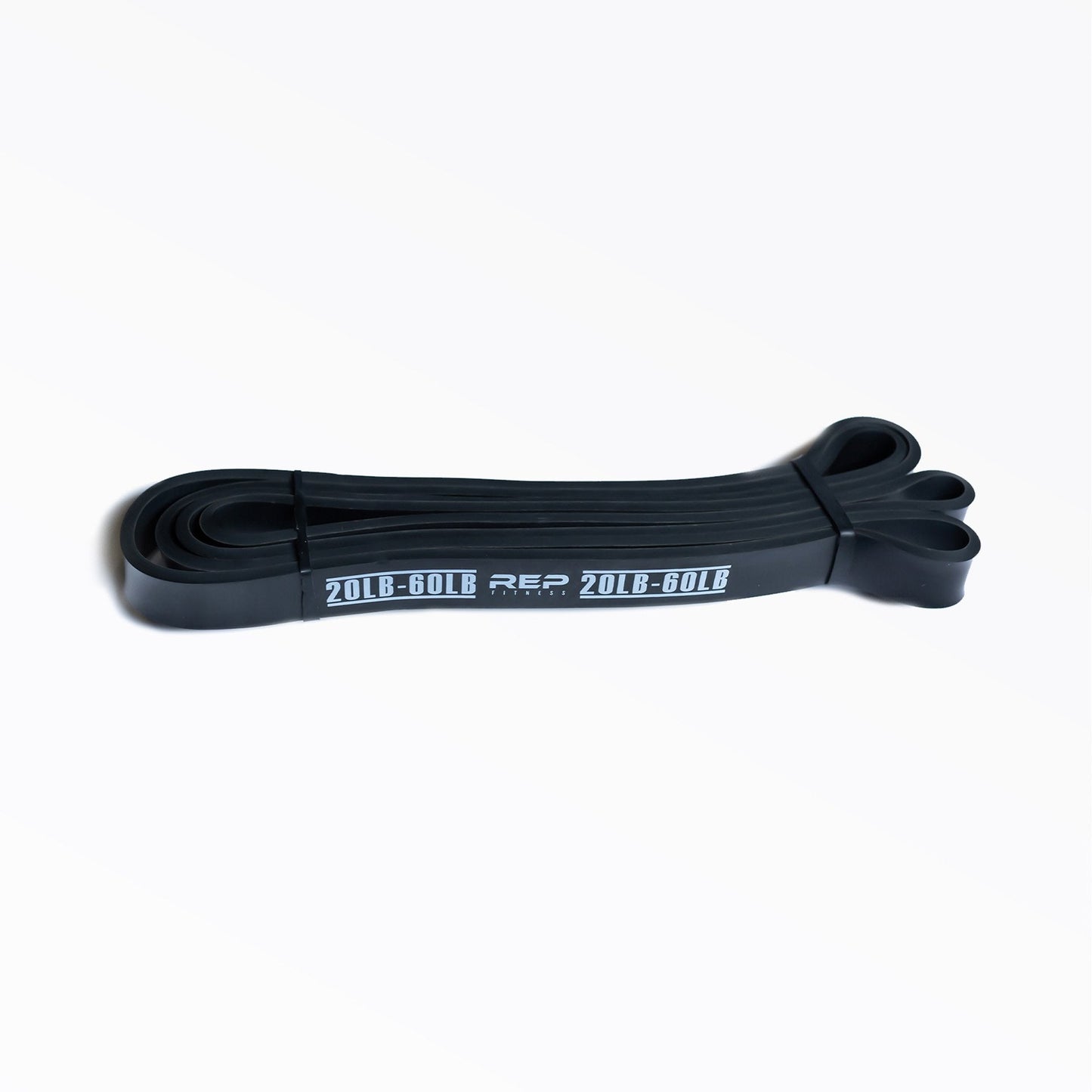 Black x-light elastic resistance bands in different sizes and colours for strength and mobility training from Rep Fitness UK | Shop Best Premium Gym Equipment for Home & Commercial Use Online