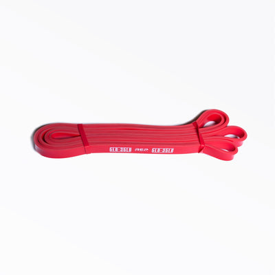 Red xx-light resistance band perfect for strength and mobility training from Rep Fitness UK | Shop Best Premium Gym Equipment for Home & Commercial Use Online