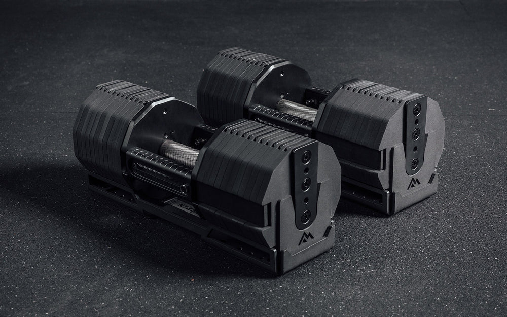 Set of Pepin black dumbbells closeup on floor from Rep Fitness UK | Shop Premium Gym Equipment for Home & Commercial Use Online
