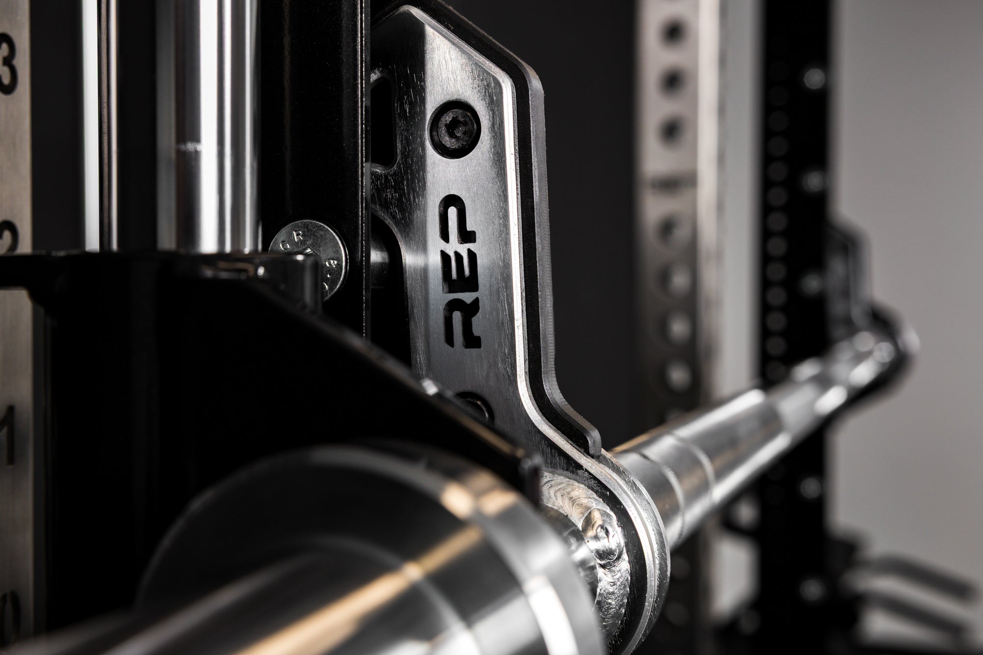 Close-up of the REP Fitness Smith Machine branding