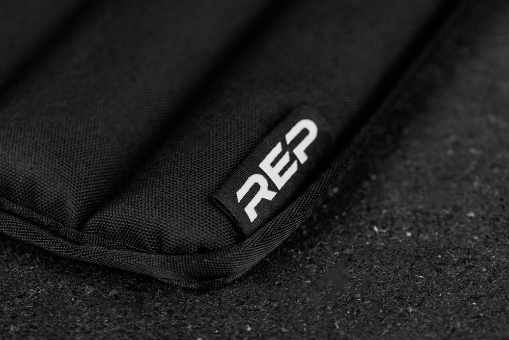 soft weight vest plate with a visible brand logo on a dark background