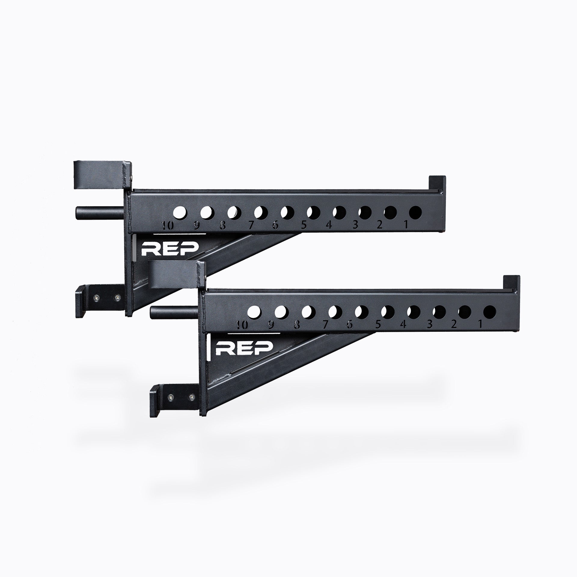 Spotter Arms heavy-duty 24” steel safety arms for power racks; 1,000 lb capacity with polyurethane lining, steel lip for bar security, 1” attachment holes, laser-engraved numbers, and durable matte black powder coat finish from Rep Fitness UK | Shop Premium Gym Equipment for Home & Commercial Use, Best Online Gym Equipment UK