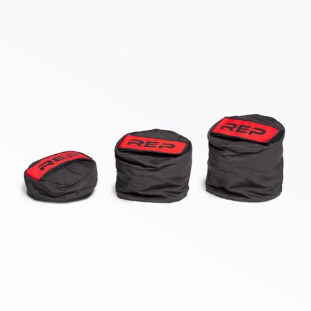 Stone Sandbags for Strongman training with Rep logo, heavy-duty, triple-stitched sandbags with reinforced seams and zipper for strength exercises like stone carries, cleans, presses, and squats. Available in 50lb, 75lb, 100lb, 150lb, 200lb and 250lb adjustable sizes from Rep Fitness UK | Shop Premium Gym Equipment for Home & Commercial Use, Best Online Gym Equipment UK