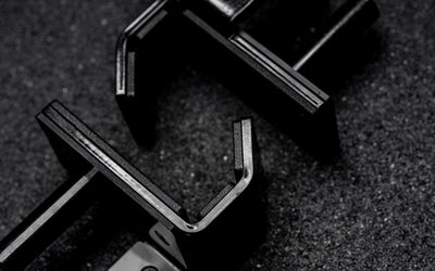 Two Standard J-Cups 2.0 – heavy-duty barbell holders for PR-5000 power rack; 3x3” 11-gauge steel with metallic black powder coat, soft plastic lining, recessed hardware, and 1,000 lb capacity for safe, scratch-free, and stable lifting on the floor from Rep Fitness UK | Shop Premium Gym Equipment for Home & Commercial Use, Best Online Gym Equipment UK