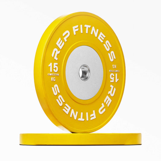 Yellow 15kg Competition Bumper Plate Pair. REP Competition Bumper Plates are premium colour-coded KG Olympic weightlifting plates designed for low bounce, ultra-durability, and repeated drops from overhead from Rep Fitness UK | Shop Premium Gym Equipment for Home & Commercial Use Online | Best Online Gym Equipment UK