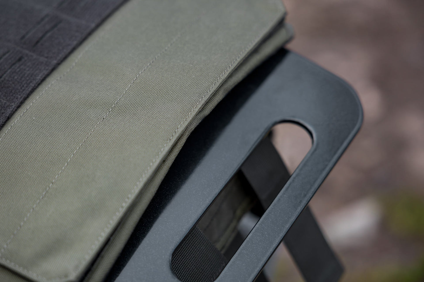 close-up of Strata Weight Vest Plate top handle, durable steel construction, ergonomic rib contour, tapered edges, top/bottom handles, compatible with REP Strata™ vest for functional fitness and HIIT from Rep Fitness UK | Shop Premium Gym Equipment for Home & Commercial Use, Best Online Gym Equipment UK