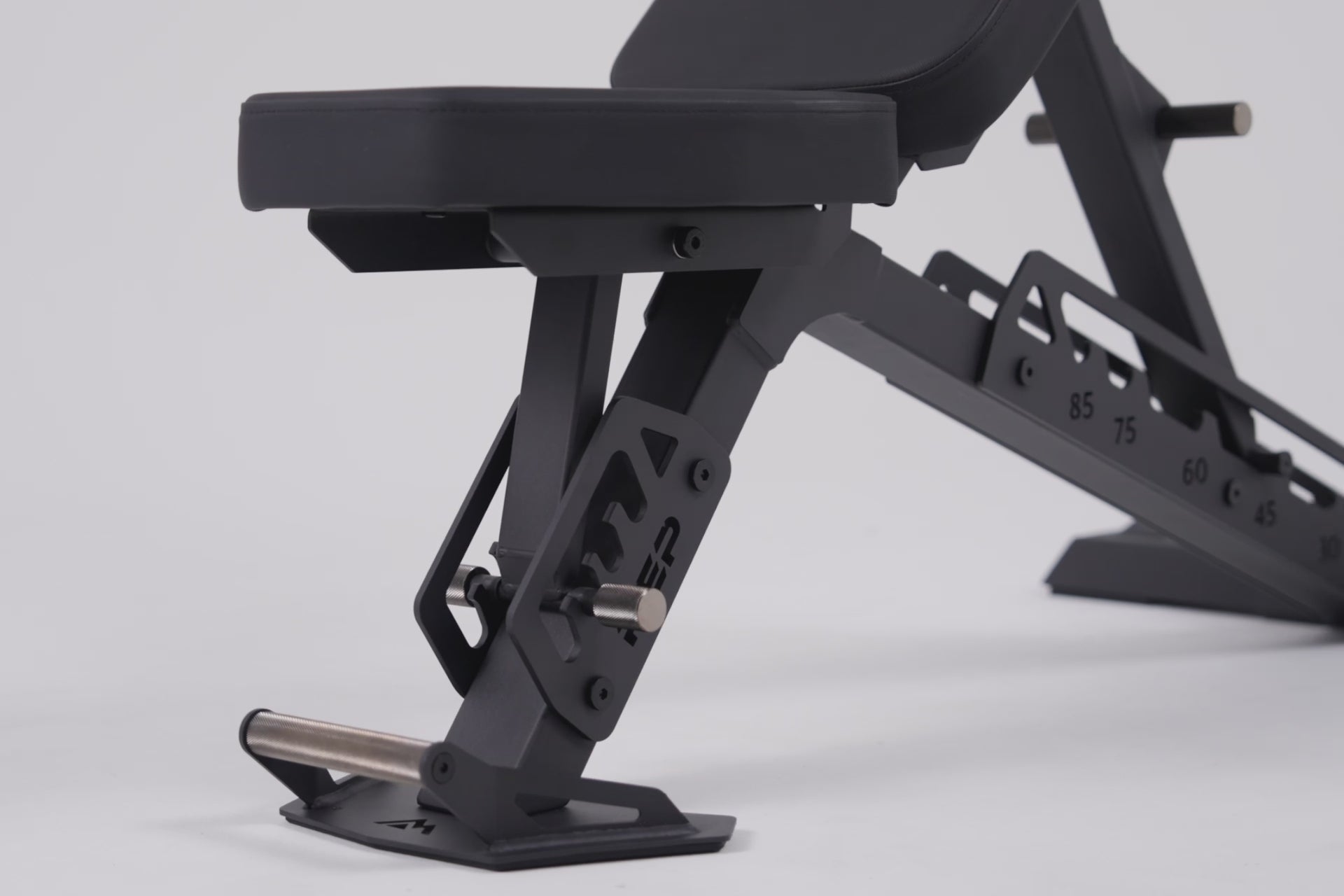 video of the front food ladder on the nighthawk, Nighthawk Bench Matte Black Adjustable Weight Bench – compact, high-performance bench for home and light-commercial gyms; 7- and 14-gauge steel frame, 7 back and 4 seat positions, CleanGrip™ vinyl pad, knurled handle, heavy-duty wheels, IPF-compliant 16.7” height, vertical storage, and compatibility with leg curl and roller attachments from Rep Fitness UK | Shop Best Premium Gym Equipment for Home & Commercial Use Online