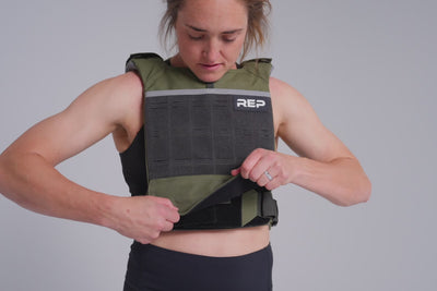 Video showing the front hook and loop closure to secure the Strata Weight Vest video showing the multiple adjustment points on the Strata Weight Vest, adjustable fit, padded ergonomic design, durable 750D Cordura®, secure plate compartments, and versatile use for strength, HIIT, and functional fitness from Rep Fitness UK | Shop Premium Gym Equipment for Home & Commercial Use, Best Online Gym Equipment UK
