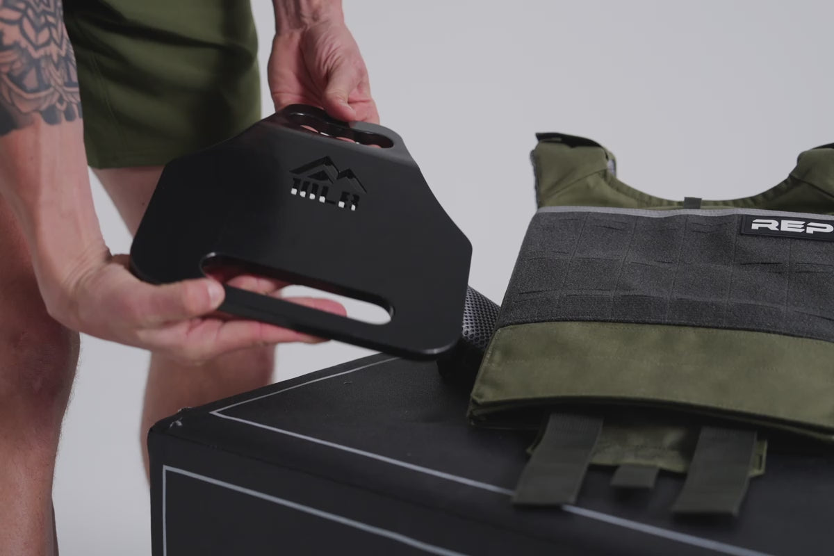 Video showing the 3 levels of interior plate securement for the Strata Weight Vest, adjustable fit, padded ergonomic design, durable 750D Cordura®, secure plate compartments, and versatile use for strength, HIIT, and functional fitness from Rep Fitness UK | Shop Premium Gym Equipment for Home & Commercial Use, Best Online Gym Equipment UK