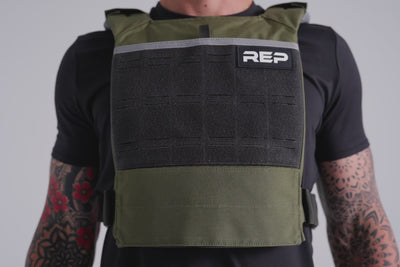 video showing how secure the Strata Weight Vest is during dynamic movements in Olive, adjustable fit, padded ergonomic design, durable 750D Cordura®, secure plate compartments, and versatile use for strength, HIIT, and functional fitness from Rep Fitness UK | Shop Premium Gym Equipment for Home & Commercial Use, Best Online Gym Equipment UK