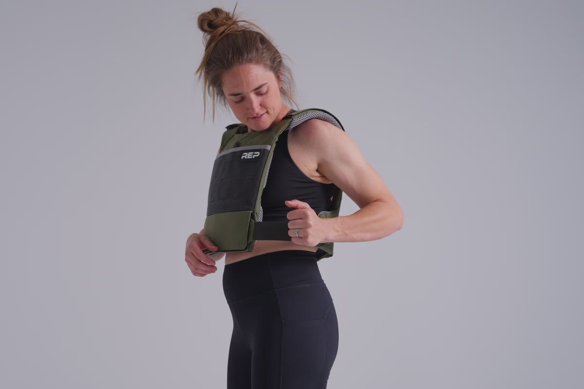 video showing the multiple adjustment points on the Strata Weight Vest, Strata Weight Vest in Olive, adjustable fit, padded ergonomic design, durable 750D Cordura®, secure plate compartments, and versatile use for strength, HIIT, and functional fitness from Rep Fitness UK | Shop Premium Gym Equipment for Home & Commercial Use, Best Online Gym Equipment UK
